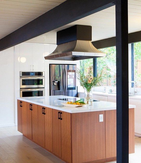 Wood Panel Island in Mid-Century Modern Kitchen via @destinationeichler
