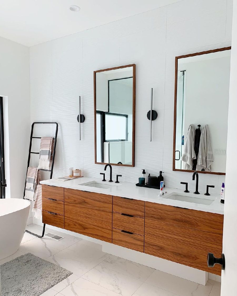 Wood Rectangular Mirrors and Black Leaning Ladder for Towels in Mid-Century Modern Bathroom via @mymoderndom