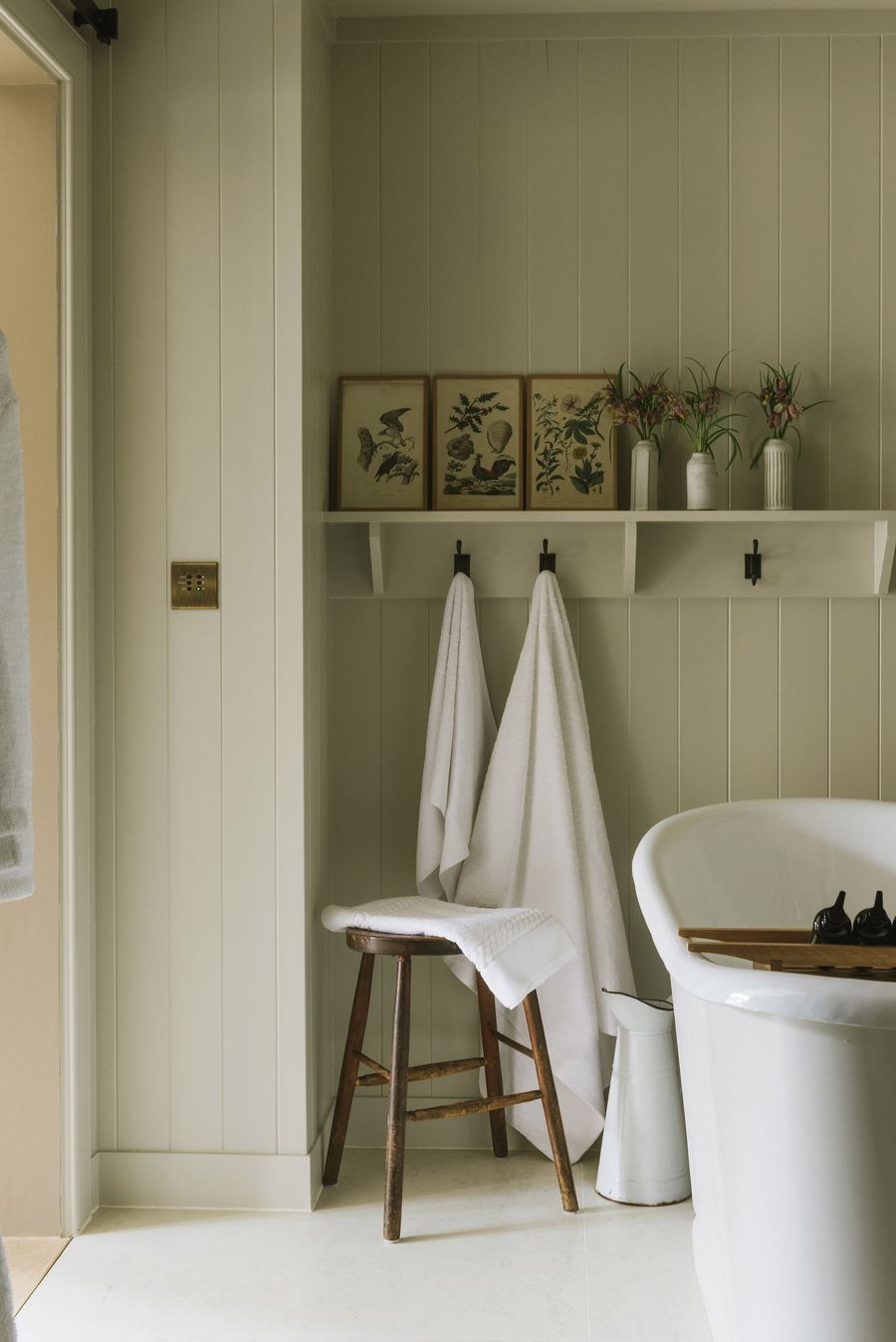 Wood stool in Modern English country bathroom via Ben Thompson Heckfield Place