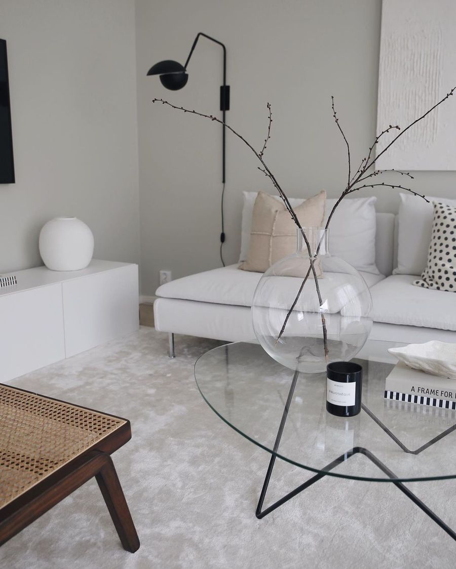 Vases Clear Glass on living room coffee table in minimalist scandi home via @emmamelins