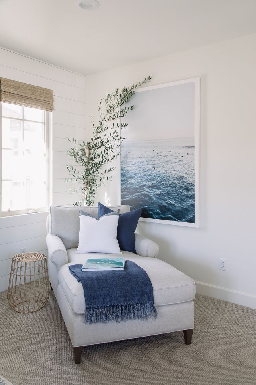 Chaise Lounge and Large Waves Photograph in Coastal Reading Nook via Pure Salt Interiors