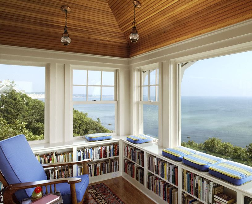 Coastal Reading Nook with Lower Bookshelves via Albert, Righter & Tittmann Architects