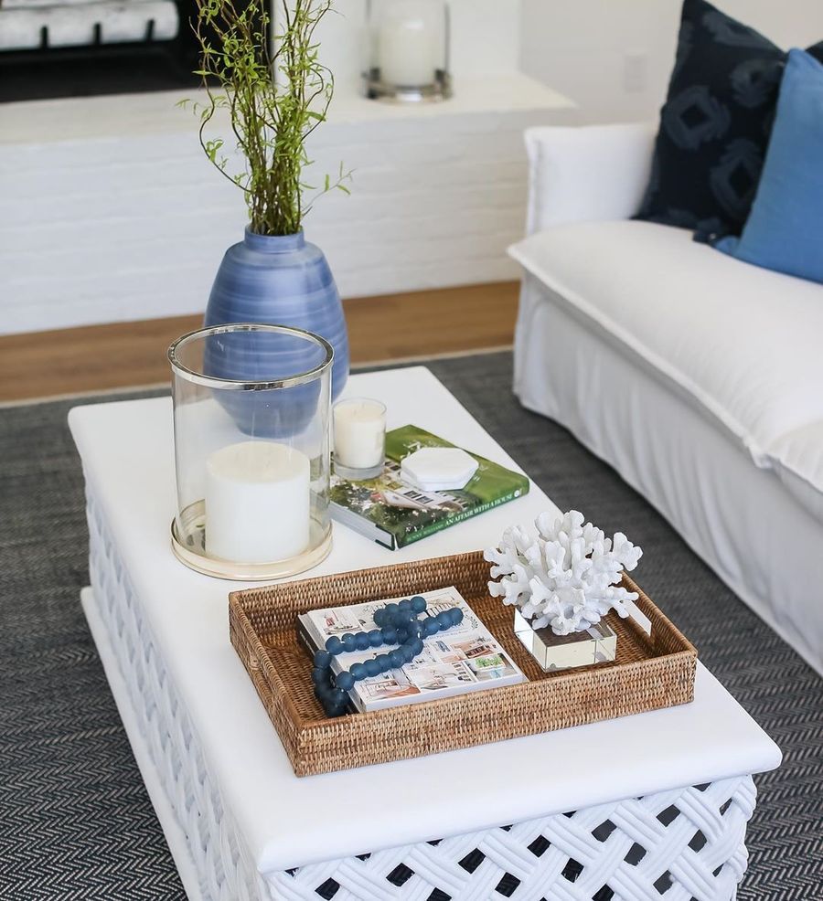 Coastal Vignette Coffee Table with woven tray and white coral sculptue via @agk_designstudio