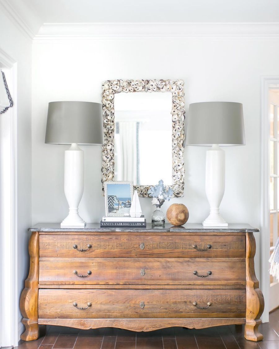 Coastal Vignette Dresser decor with shell mirror and twin white table lamps via @agk_designstudio