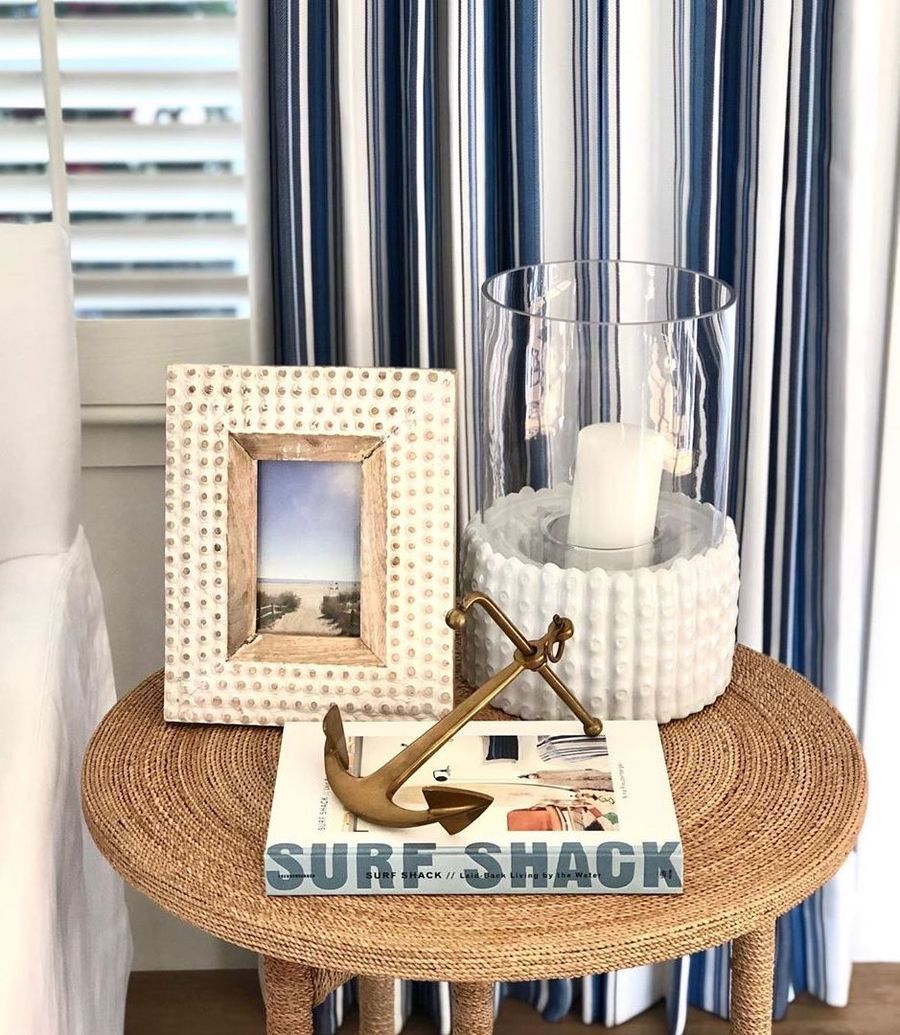 Coastal Vignette side table with Surf Shack Book and anchor decor via @agk_designstudio