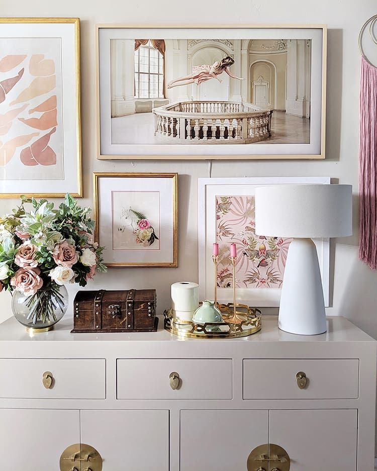 Glam Vignette Gallery Wall of Photos above Dresser via @swoonworthyblog