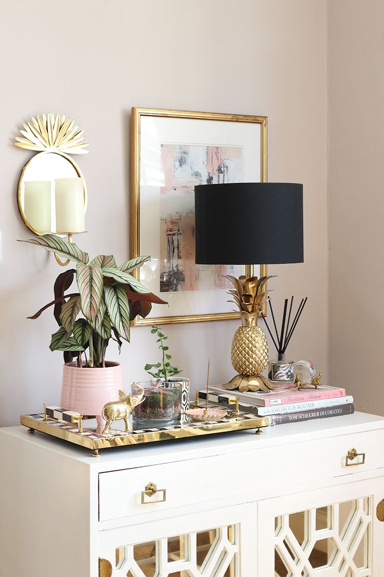 Glam Vignette Styling Tropical Pineapple Decor via Swoonworthy