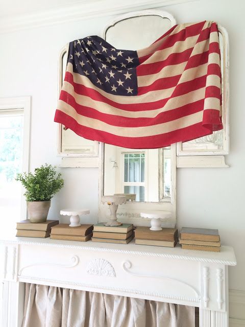 4th of July Farmhouse Decor with Vintage Flag Hanging over Frame via littlefarmstead