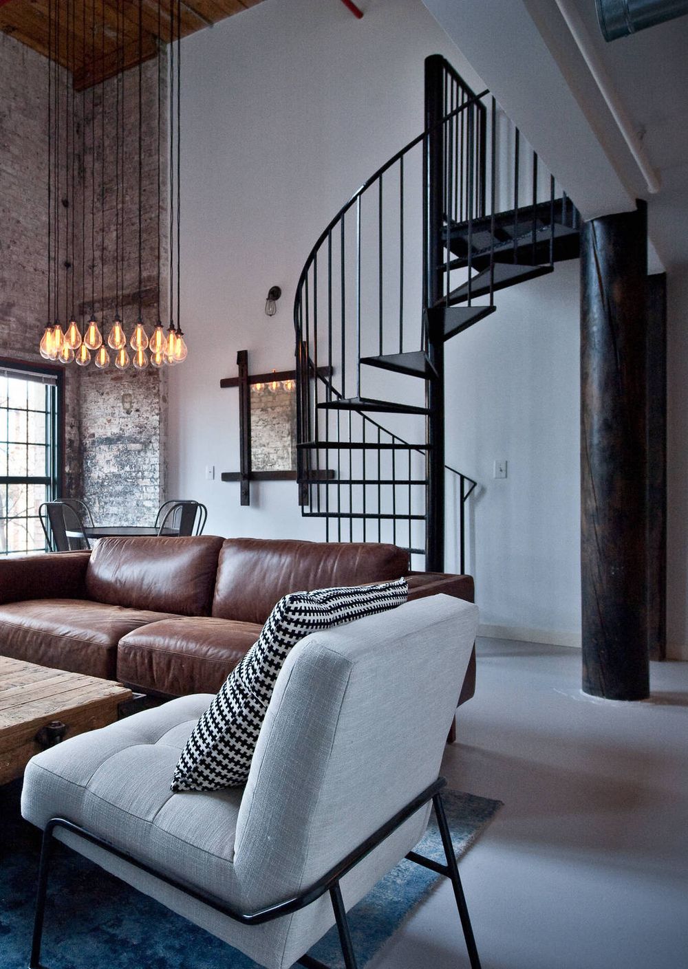 Industrial Staircase Design via Heirloom Design Build