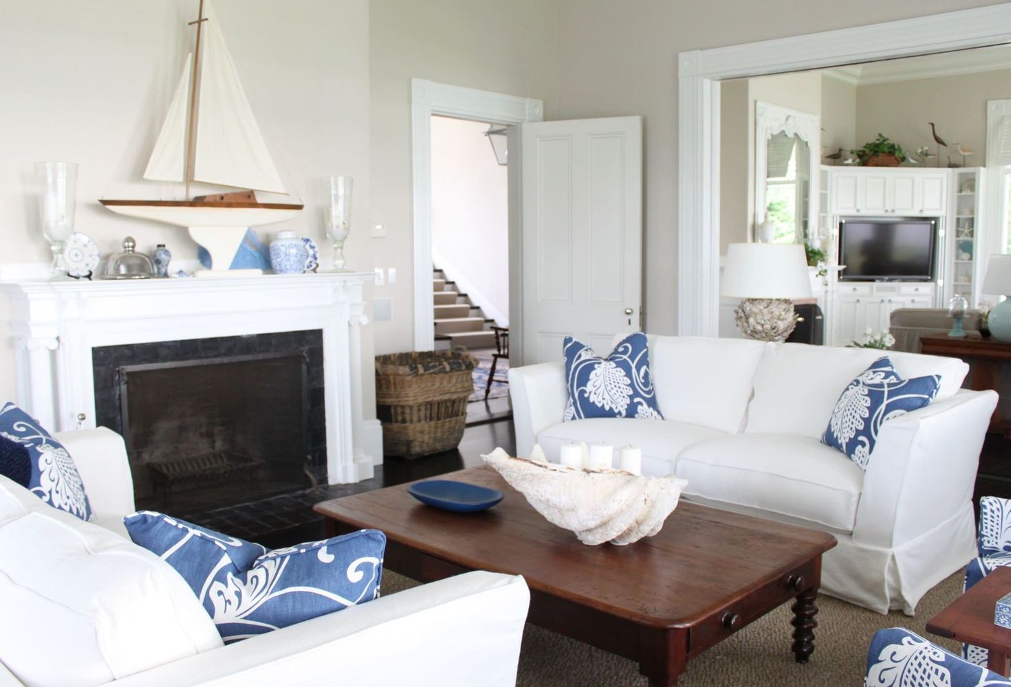 Crisp White Sofas Nautical Living Room Decor via Molly Frey Design