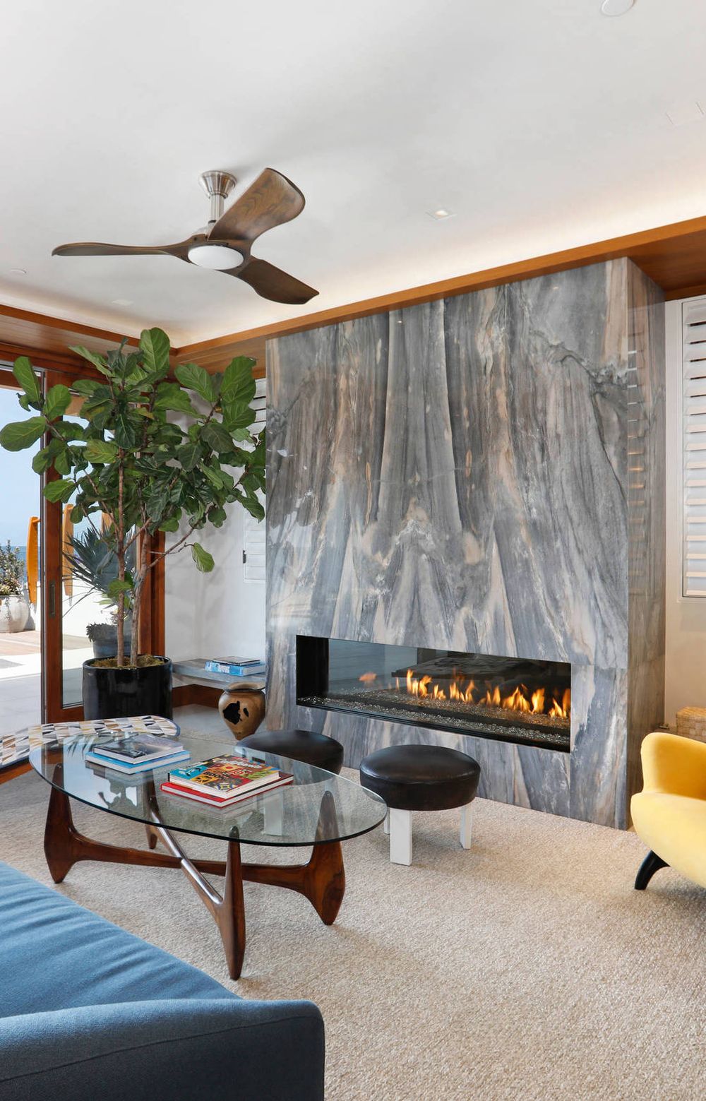 mid century modern living room with fireplace