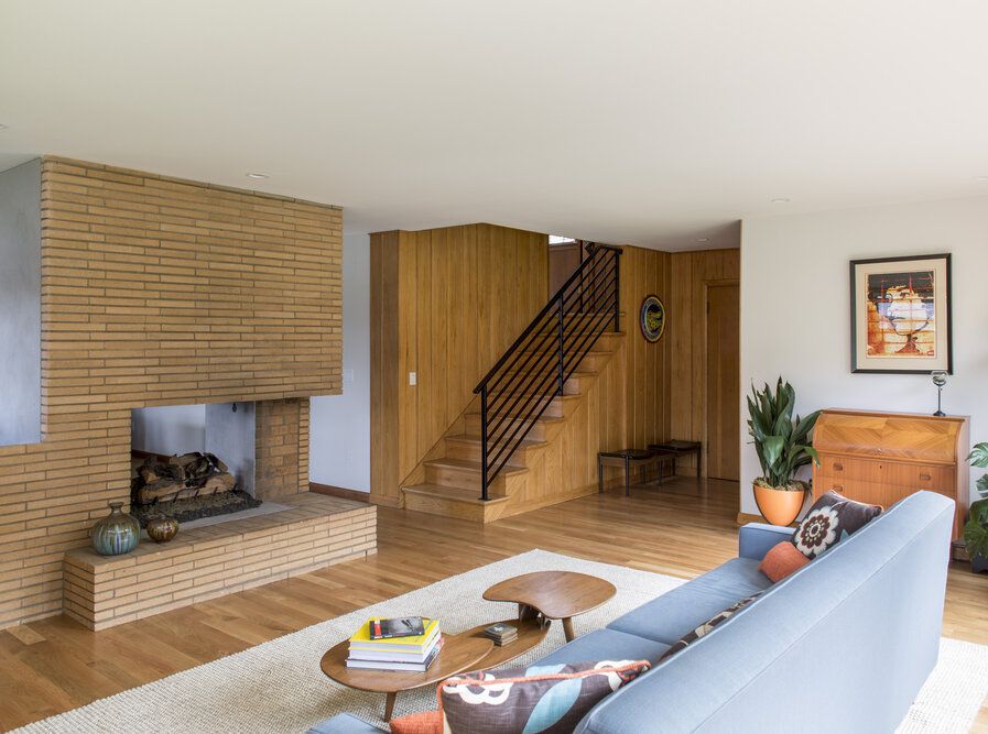 Mid-century modern brick fireplace design by Risa Boyer Architecture