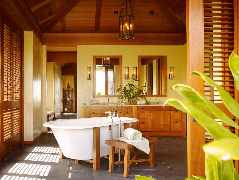 Tropical bathrooms in hawaii bamboo cabinets via Dara Rosenfeld