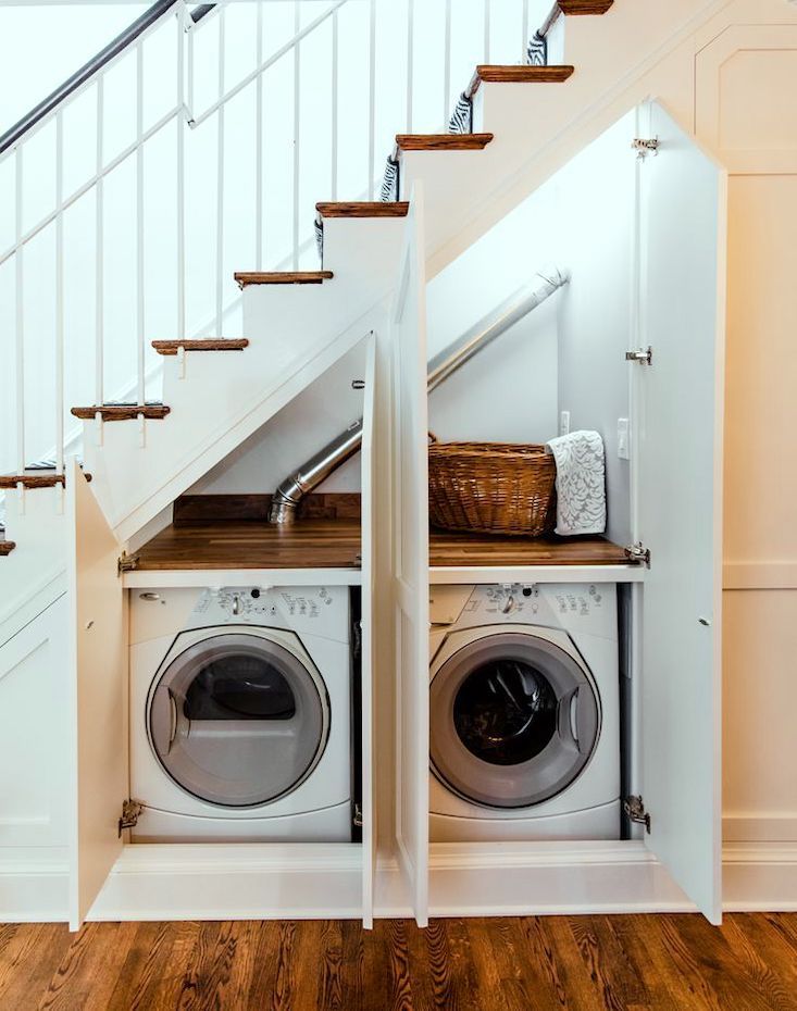 Under the Staircase Laundry Machines via Brickhouse Cabinetry