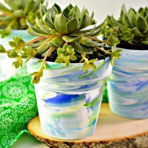 Blue marbled planter pots DIY Coastal decor via naturalbeachliving