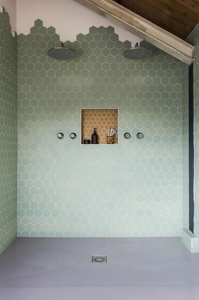 Sage Green Hexagon Tiles in Bathroom Shower via Designs by Katy