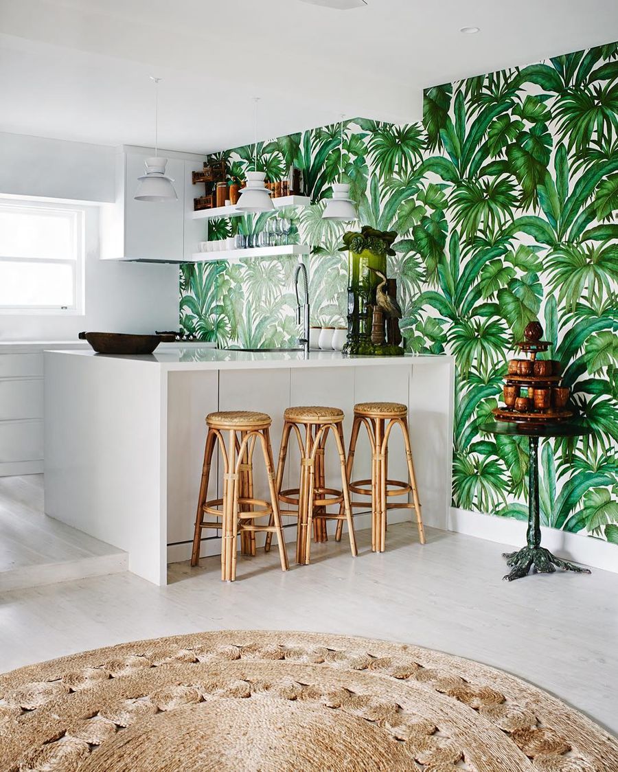 Tropical Kitchen with Rattan bar Stools and Banana Leaf Green Versace Giungla wallpaper via alexandragordonstylist