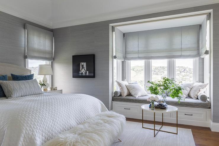 White and Gray Bedroom with Window Seat Nook by ej interior design