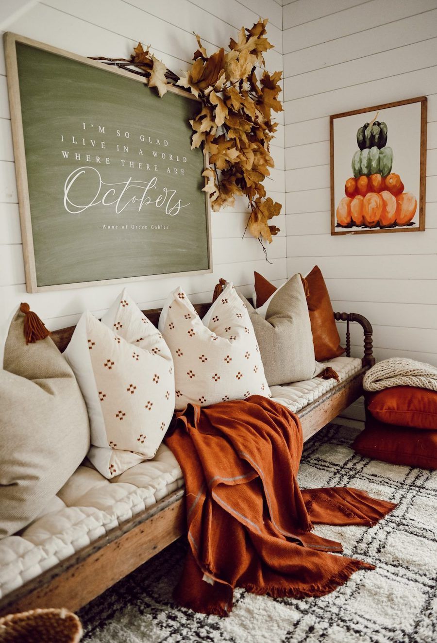 Cozy fall throw pillows on sofa fall living room decor ideas via lizmarieblog