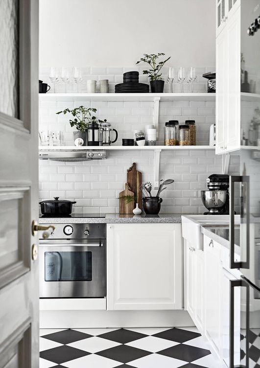 https://curatedinterior.com/wp-content/uploads/2021/08/Minimalist-Kitchen-with-Checkered-Floors-via-stadshem.se_.jpg