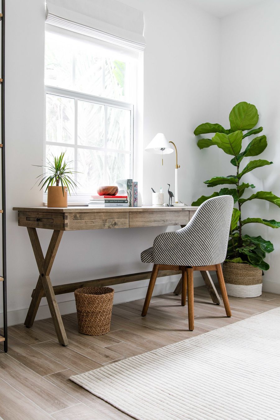 Tropical Office wood desk fiddle leaf fig corner via thehabco