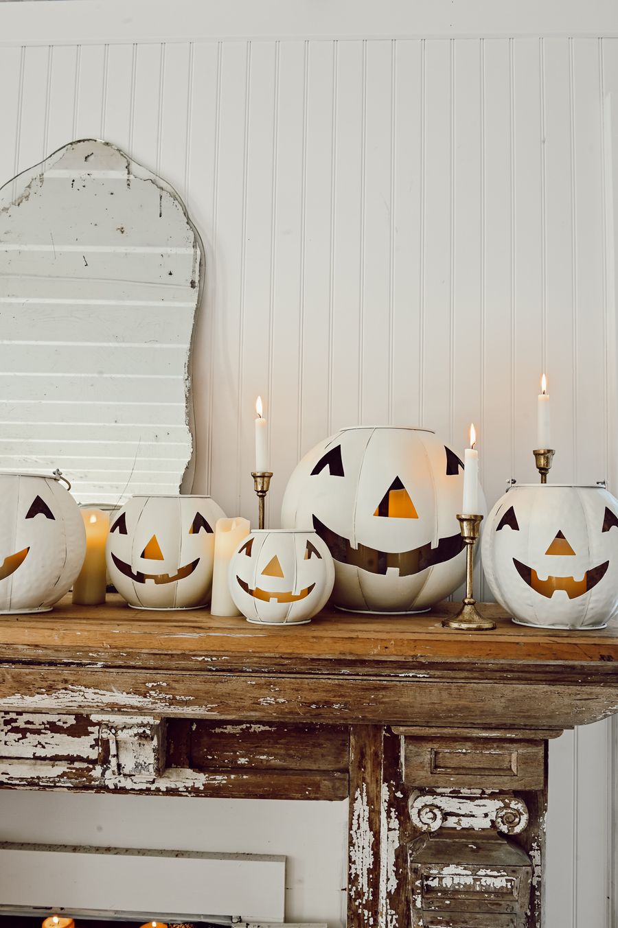 Farmhouse Halloween decor White Jack-o-Lanterns on Fireplace Mantel via lizmarieblog