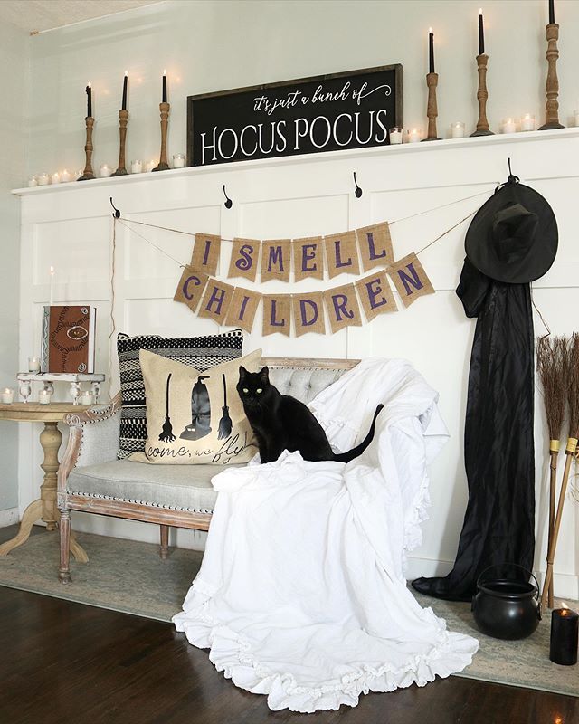 Farmhouse halloween decor Hocus Pocus Sign and Black cat entryway via ourlittlewhitebungalow