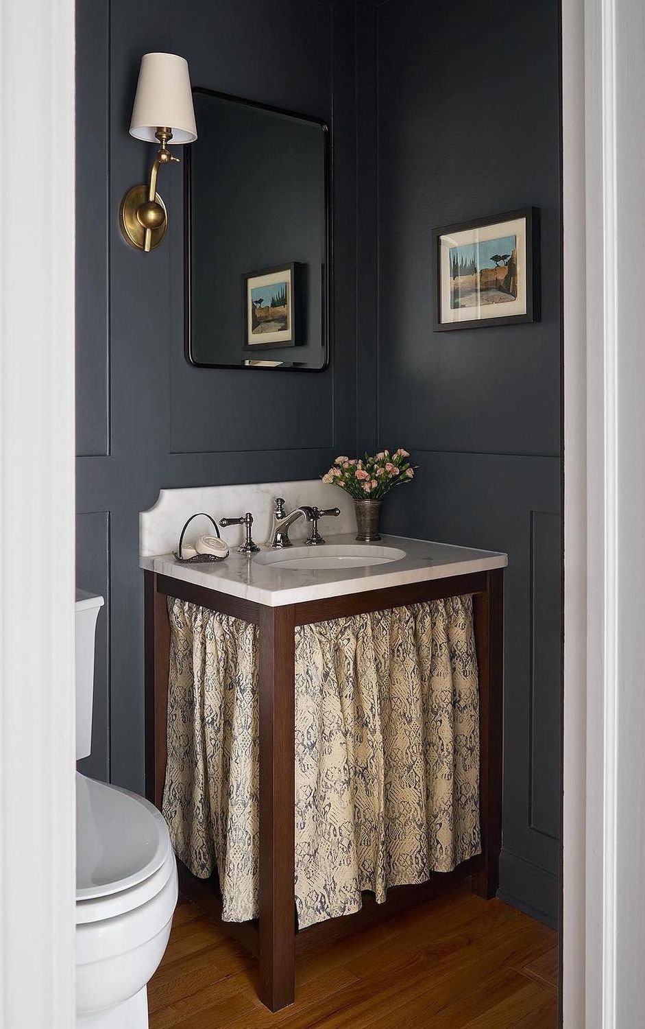 Traditional bathroom black walls skirted sink alessiazanchiloffredo