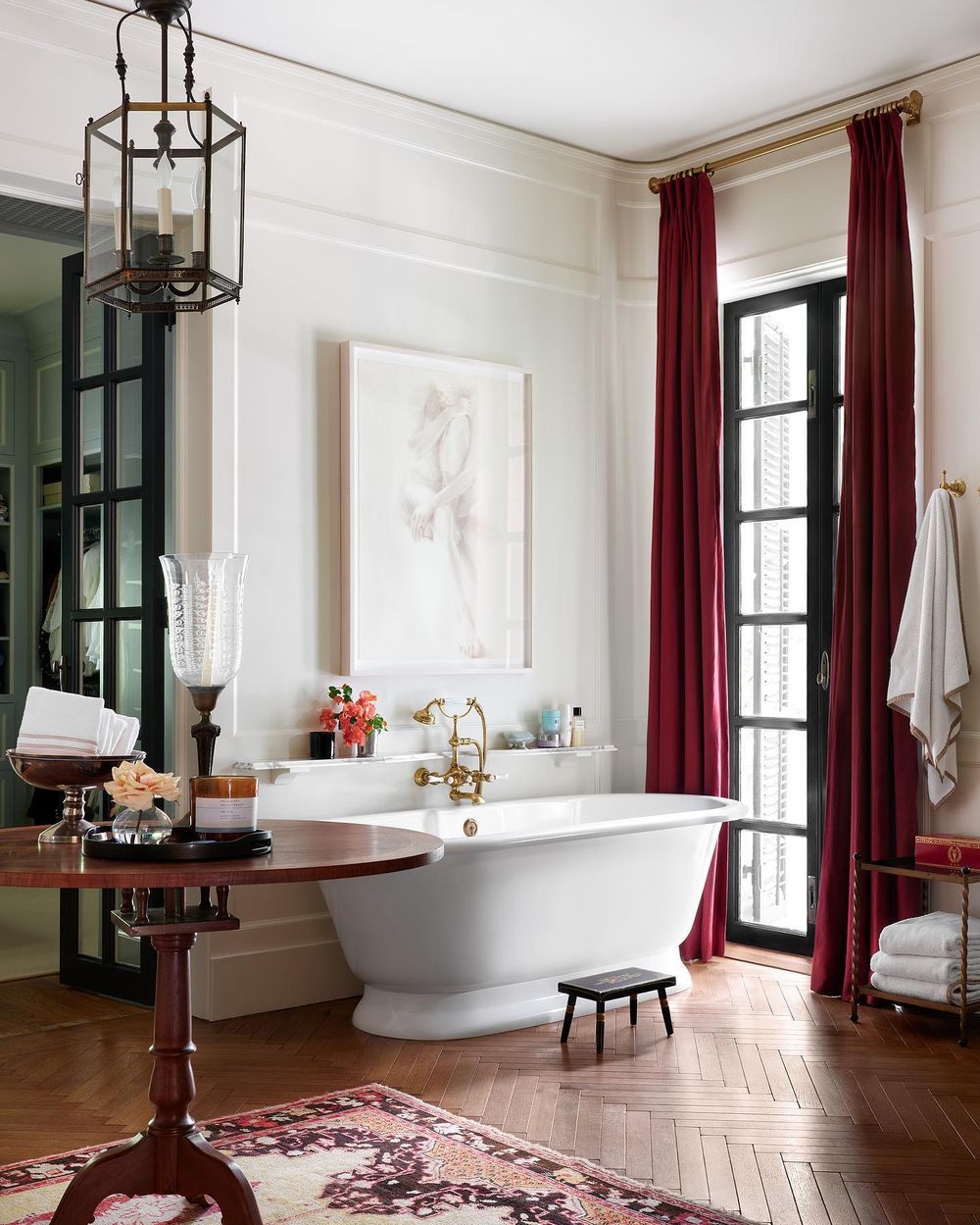 Traditional bathroom design burgundy curtains and white bathtub ashleyputman