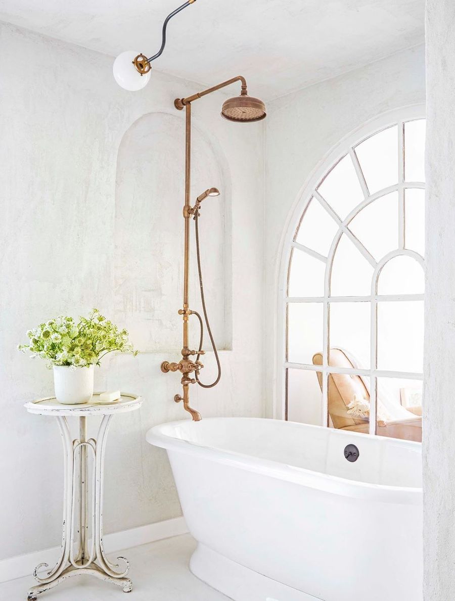 Vintage Bathroom brass hardware bathtub via @leannefordinteriors