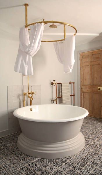 Vintage Bathroom with Circular Bathtub via Berdoulat & Breakfast