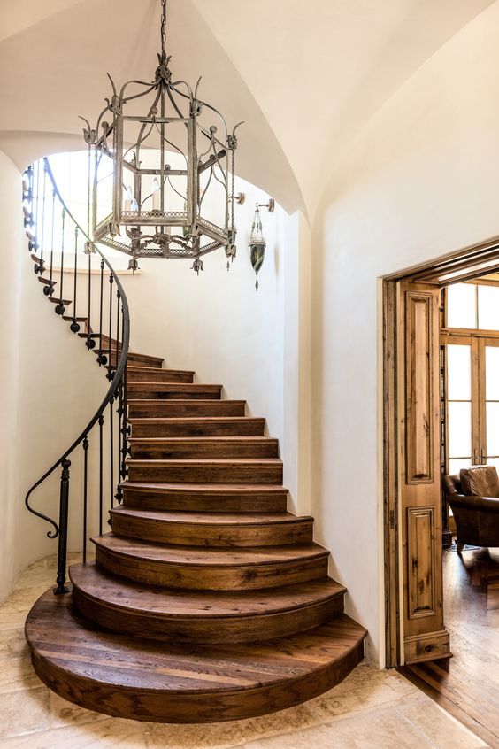 French country staircase wood steps black iron railiing Stocker Hoesterey Montenegro Architects