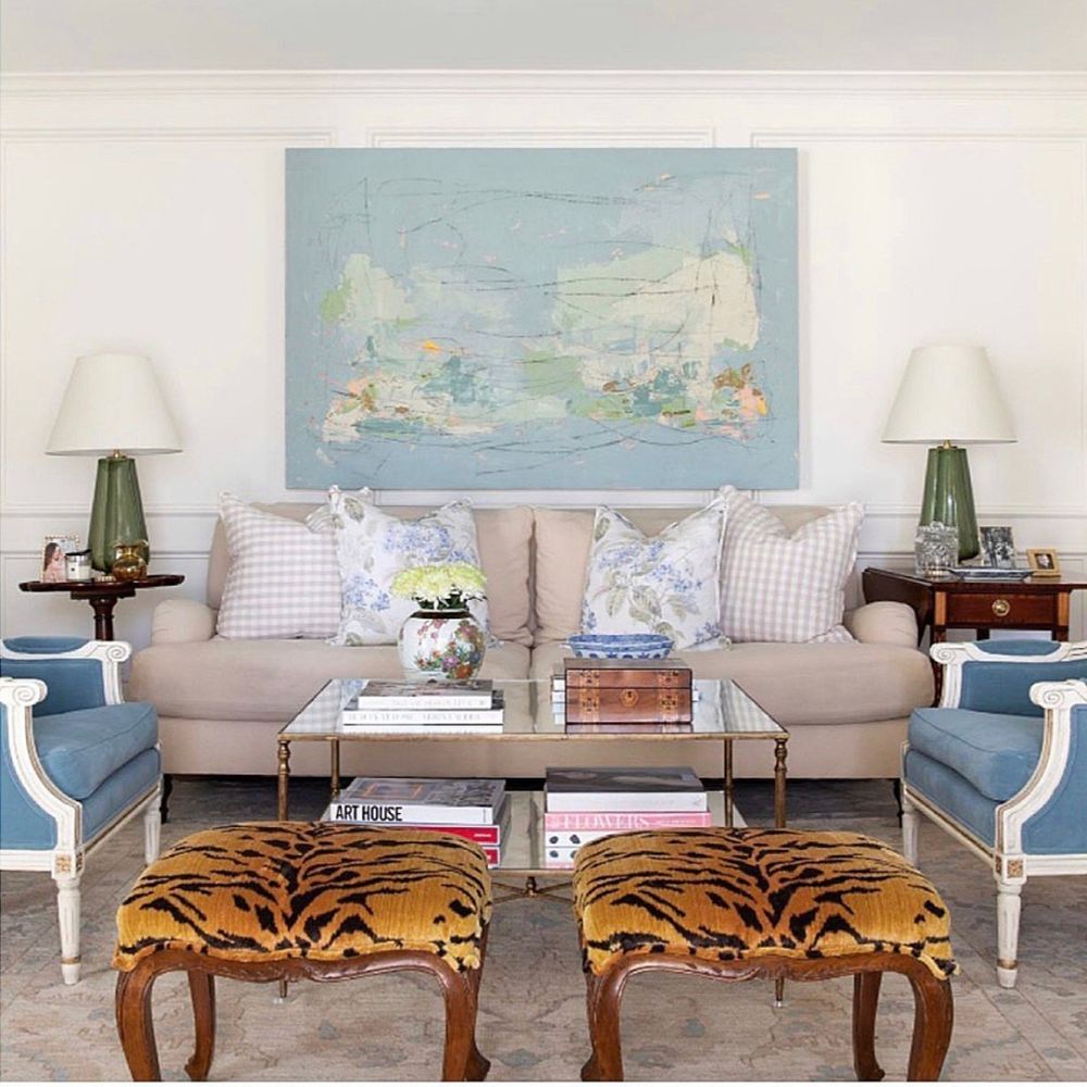 Neo-Traditional Living Room Tiger print stools @jenniferbarroninteriors