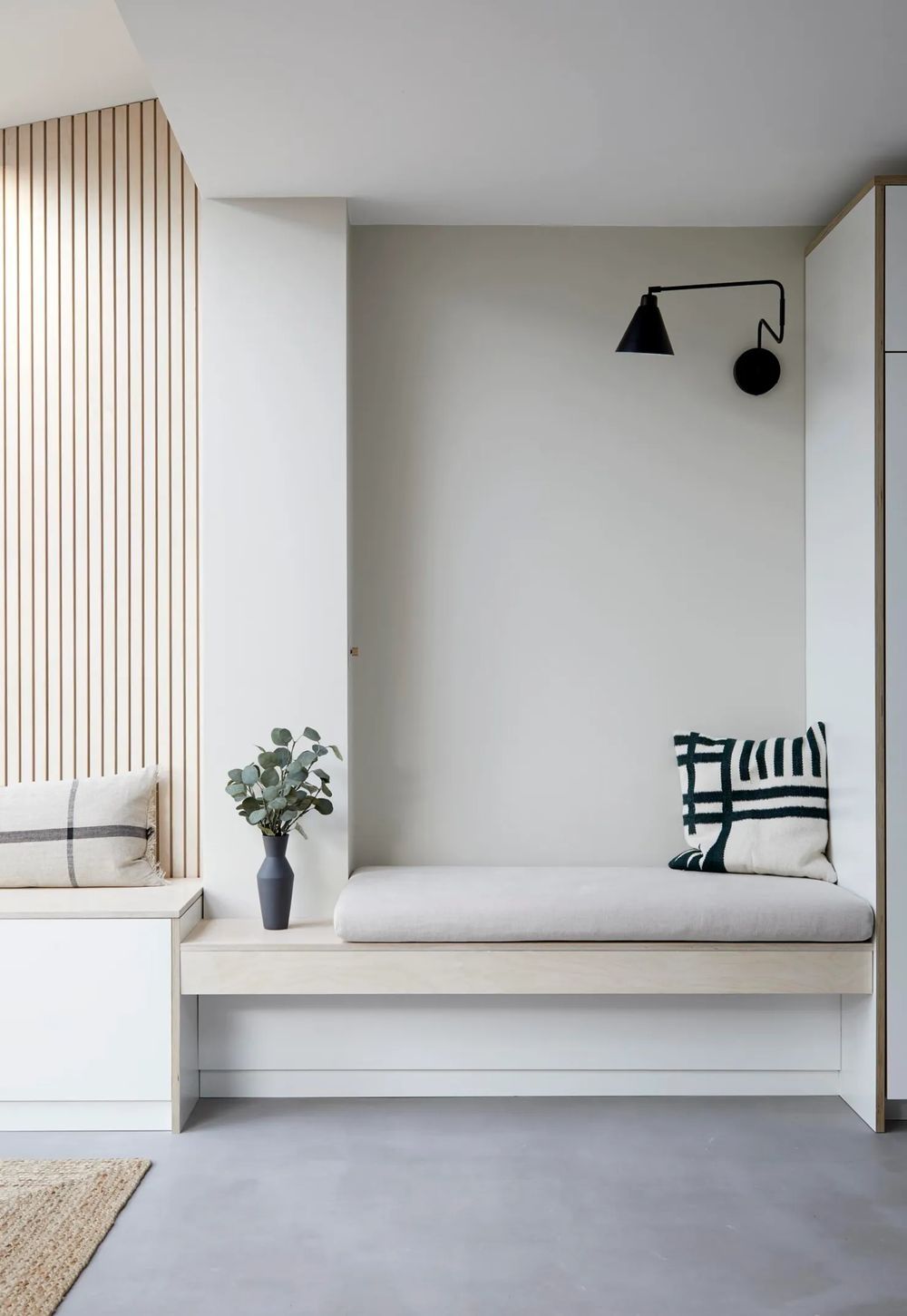 Scandi reading nook Corner Bench and Swing Light via Emily Mayne