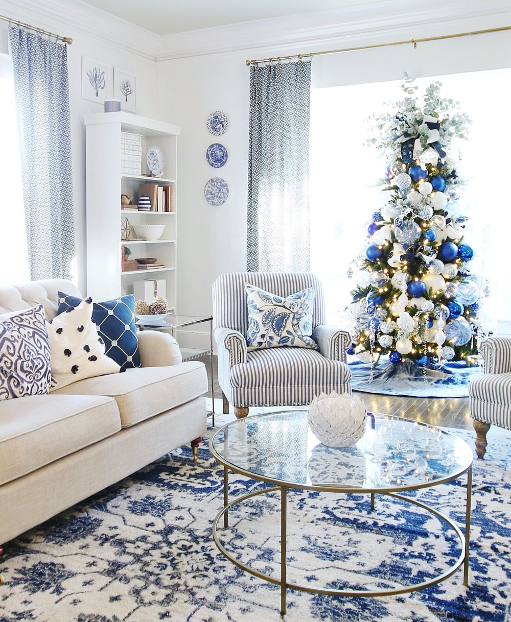 Blue and white christmas living room decor via thistlewoodfarms