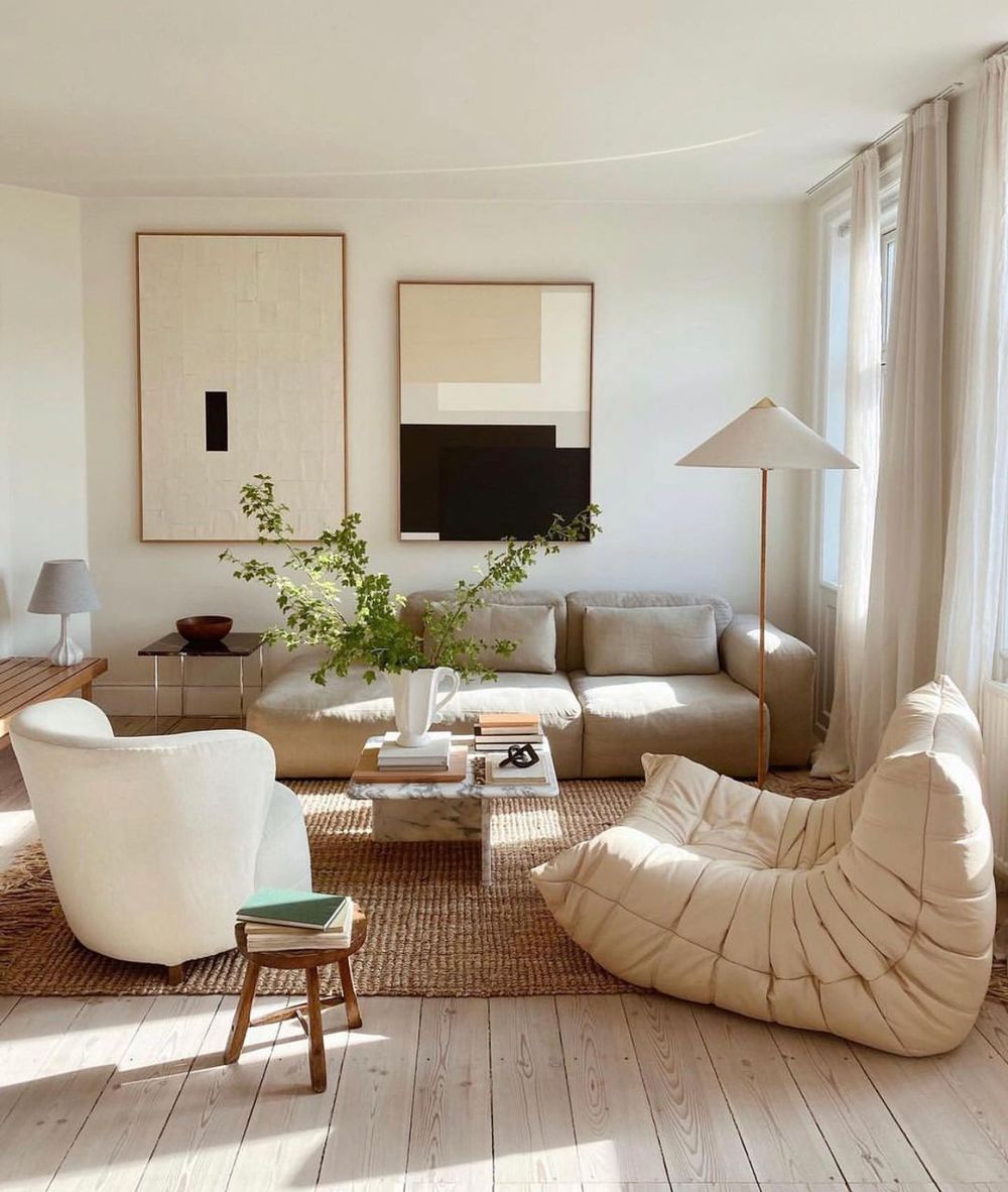 https://curatedinterior.com/wp-content/uploads/2022/04/Beige-Living-Rooms-Togo-chair-via-@polkenstudio.jpg