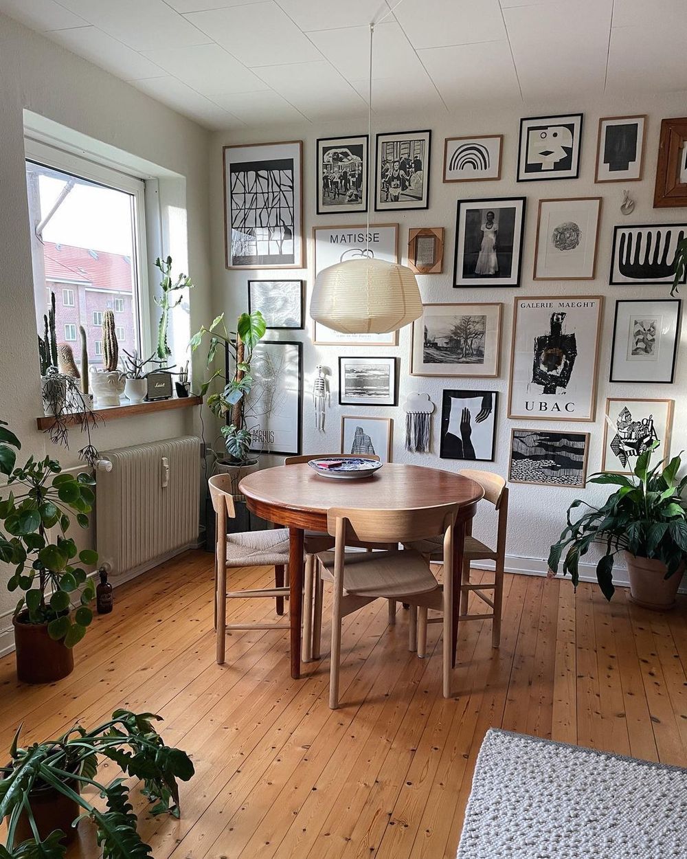 Gallery wall black and white danish dining room via @thildesecher