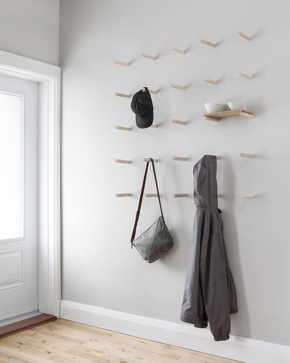 Minimalist Entryway with Wall Rods via @kielyramosphoto