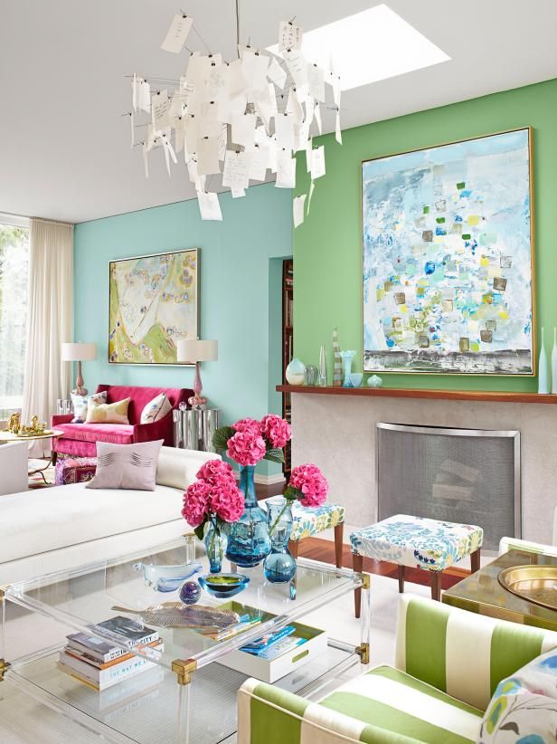 Colorful living room blue green accent walls via hgtv