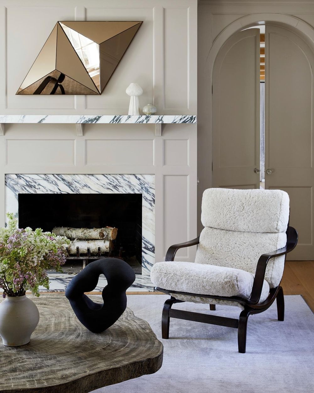 Contemporary interior design fireplace marble Muted Colors emilydelbellointeriors