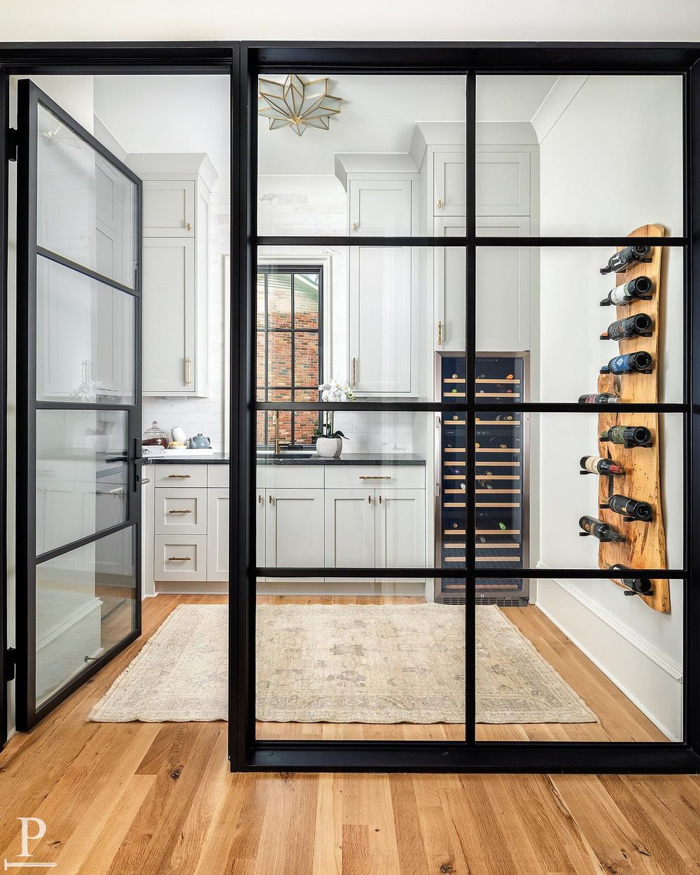 Glass Paned Door to home wine storage room @pikeproperties