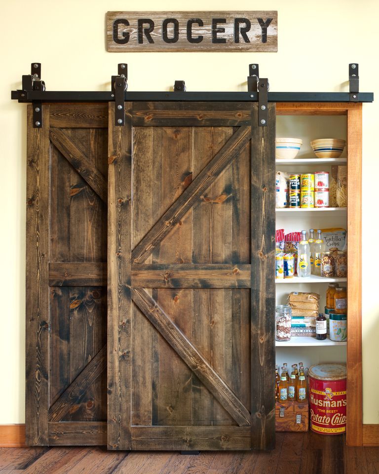 Kitchen Pantry barn door ideas via countryliving