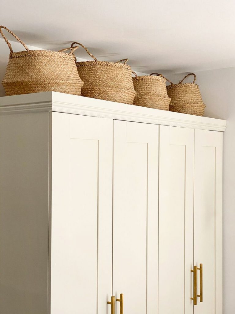 Storage baskets on top of armoire wardrobe home ideas via designconfetti