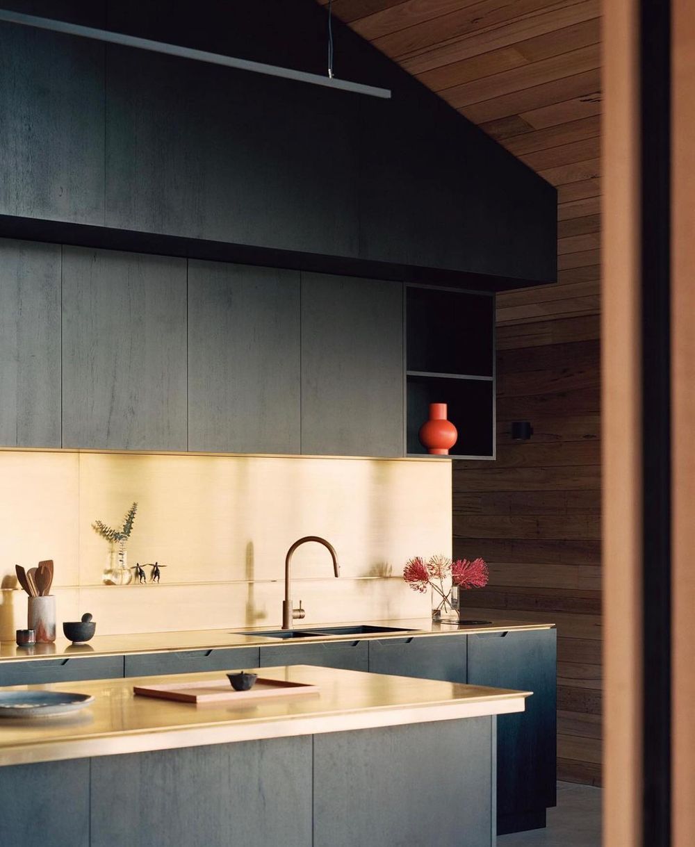 Brass kitchen counter and backsplash @dreamer.lab