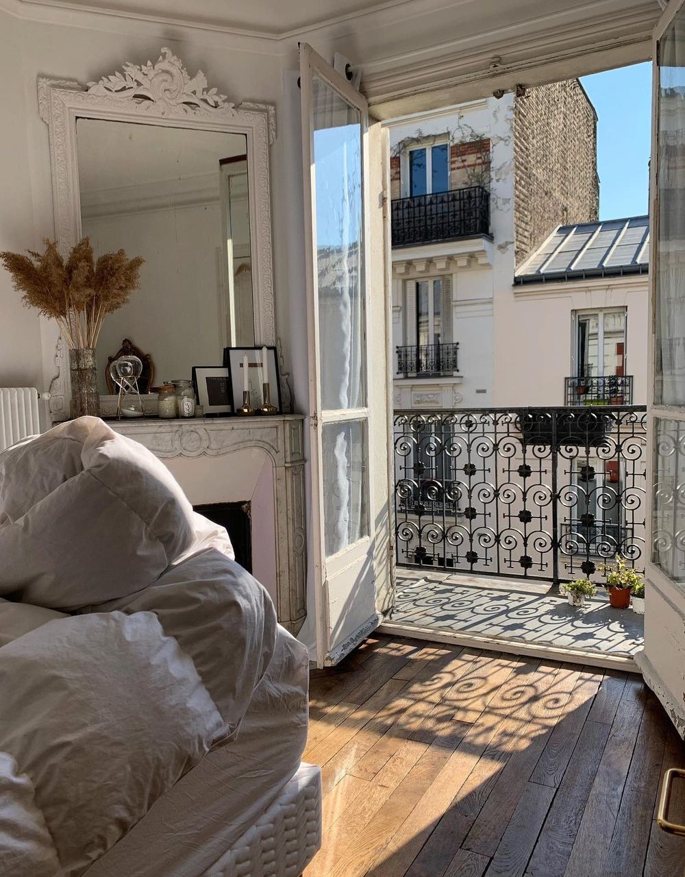 Parisian Haussmann Style Apartment decor black iron balcony fadela