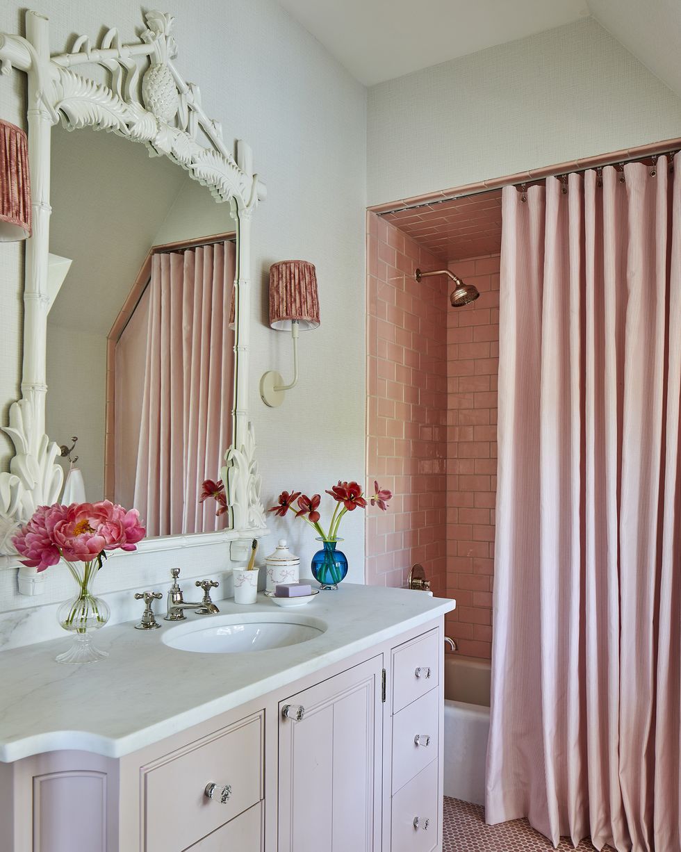 Pink bathroom shower tile and curtain Hundley Hilton Interiors