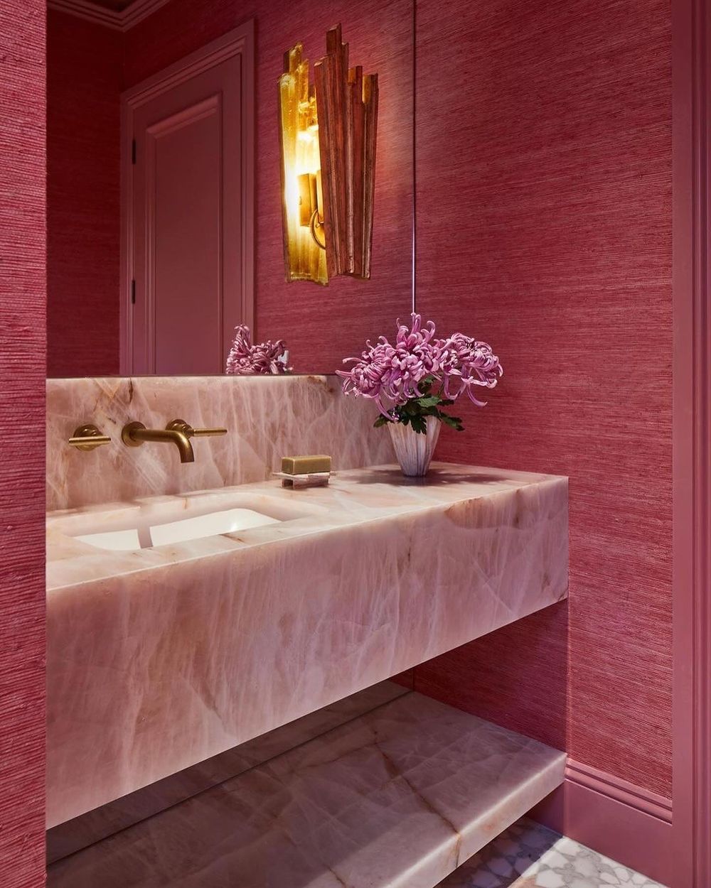 Pink bathroom textured wallpaper and marble sink @katewalker_design