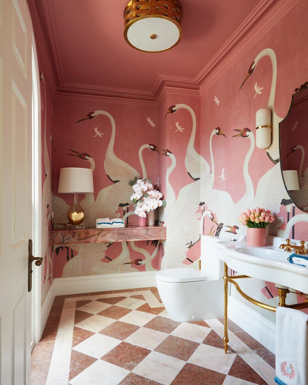 Pink bathroom with swan wall art Kate Walker Design