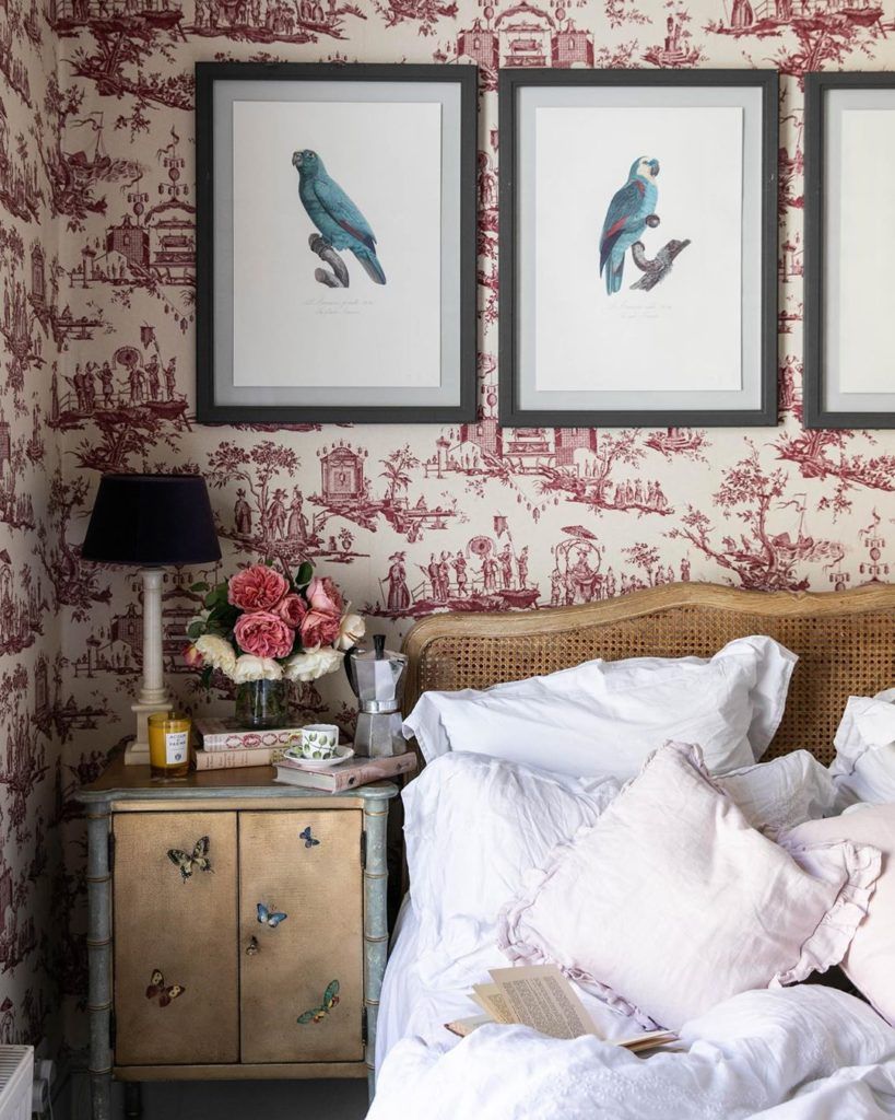 Toile wallpaper red bedroom cane headboard Skye McAlpine