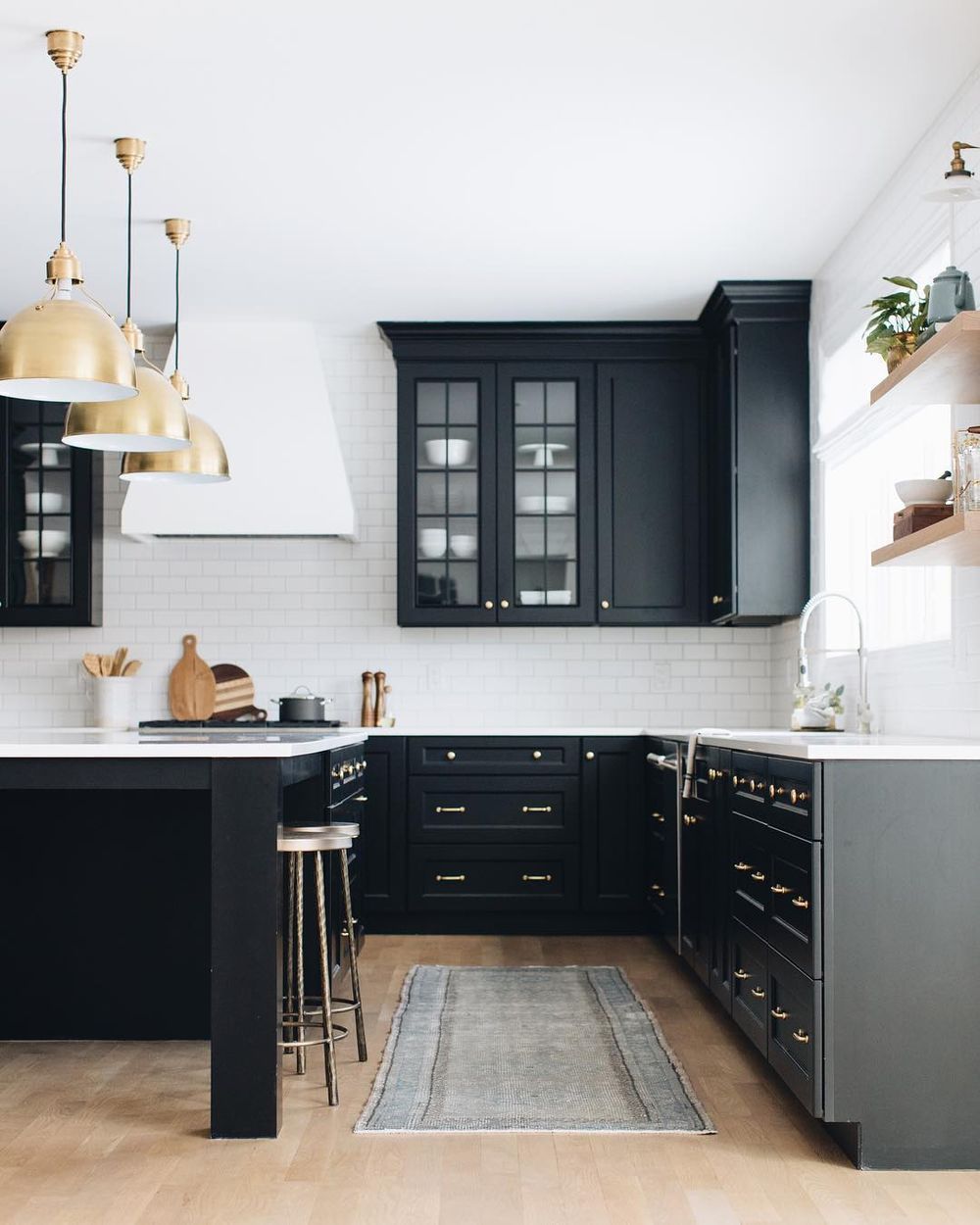 Black kitchen cabinets @stofferphotographyinteriors